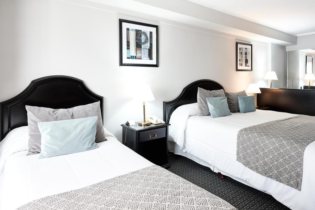 Plaza Real Suites Hotel Rosario Bagian luar foto