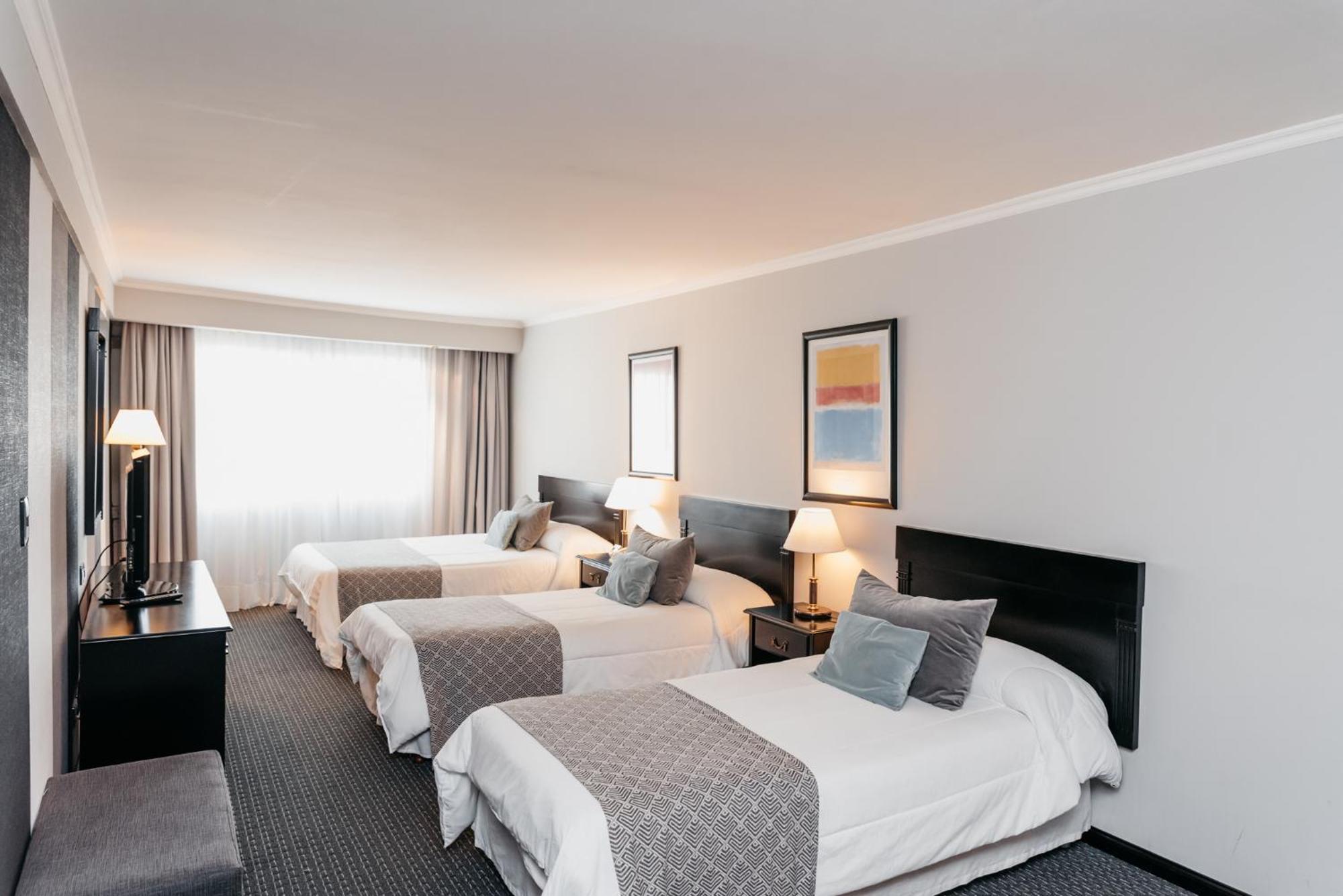 Plaza Real Suites Hotel Rosario Bagian luar foto
